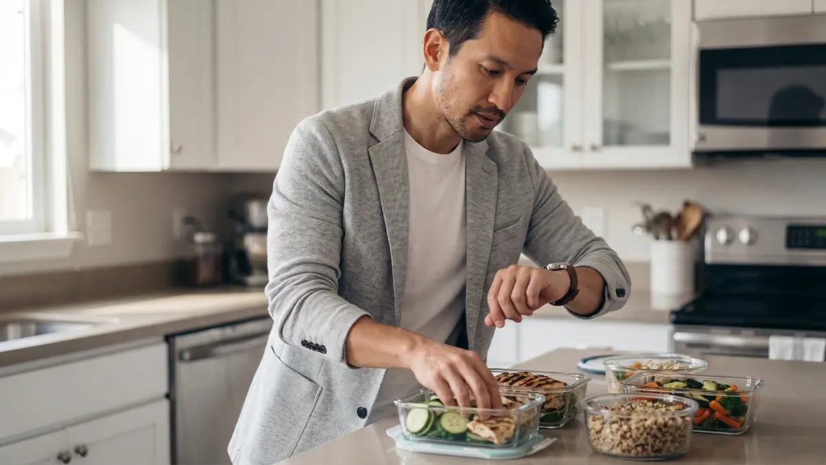Busy professional packing a healthy lunch.