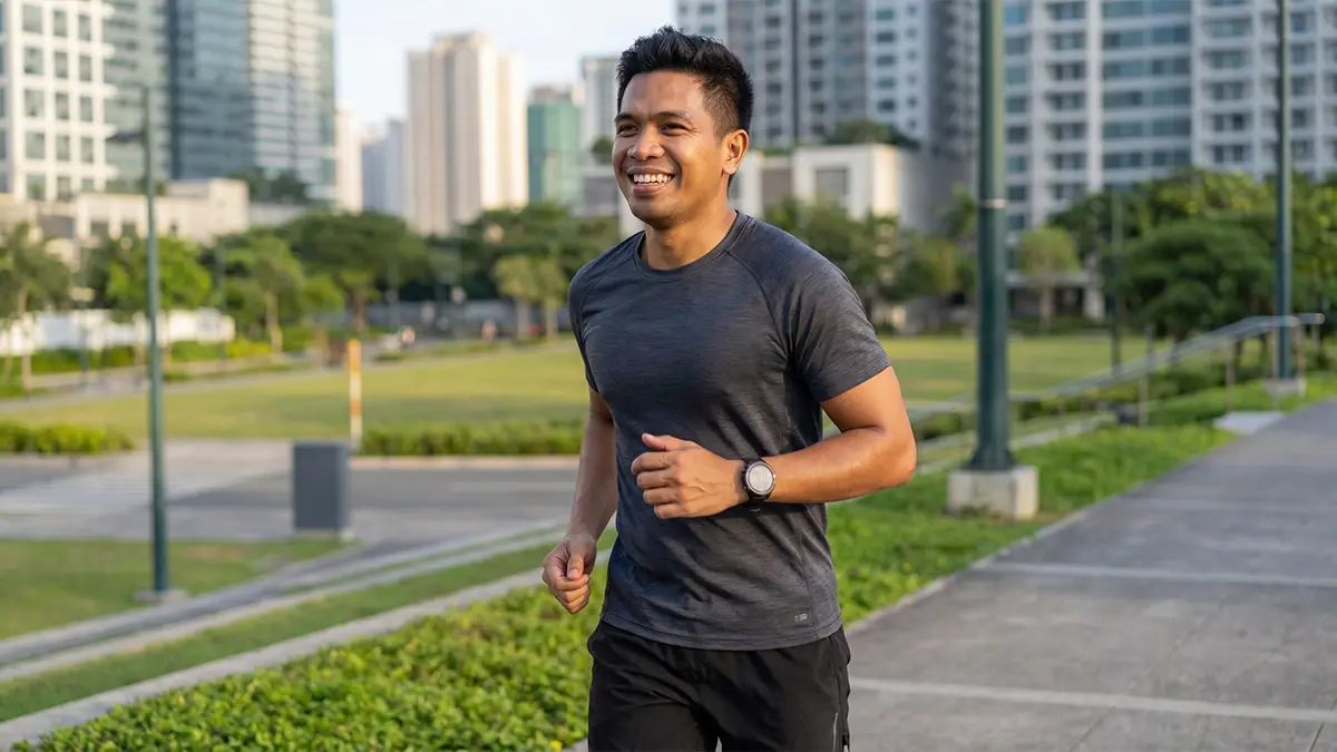 Person walking outdoors in activewear.